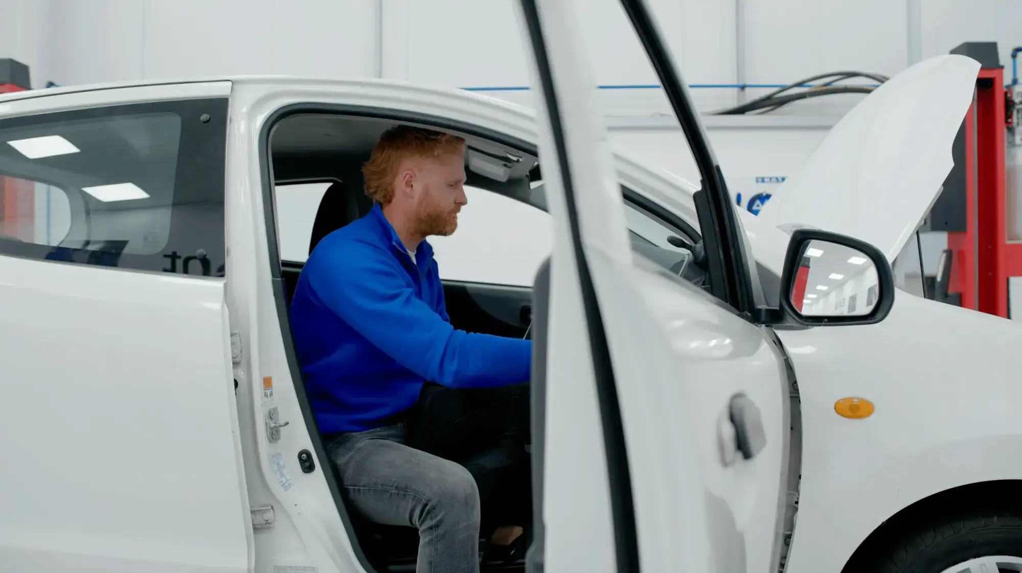 driver-turning-on-car-engine